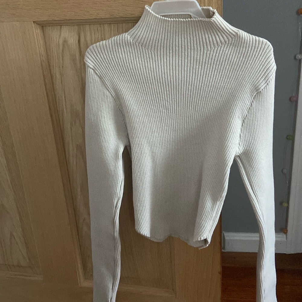 light beige soft and stretchy sweater